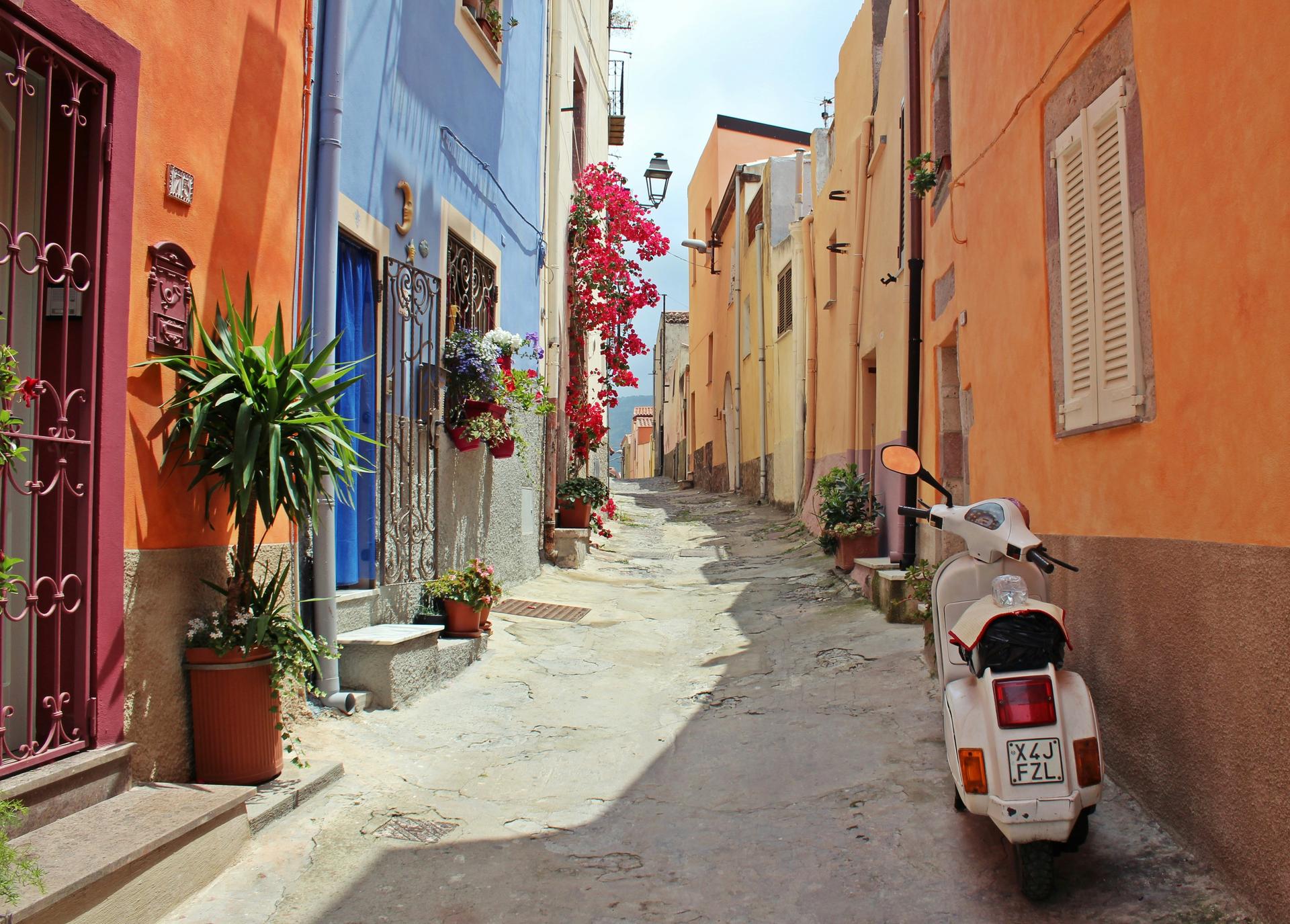 Moto in an alley overlooking the sea.